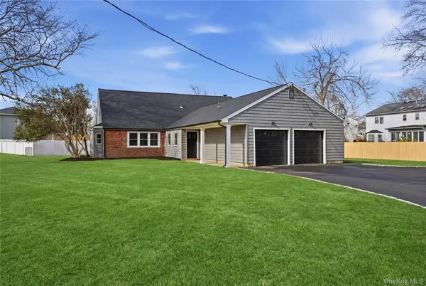 front view of a house and a yard