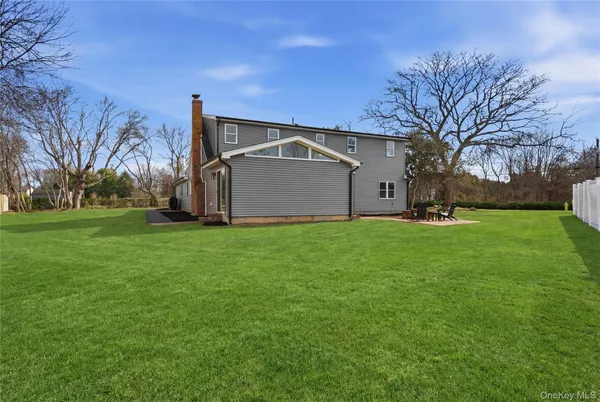 a view of backyard with green space