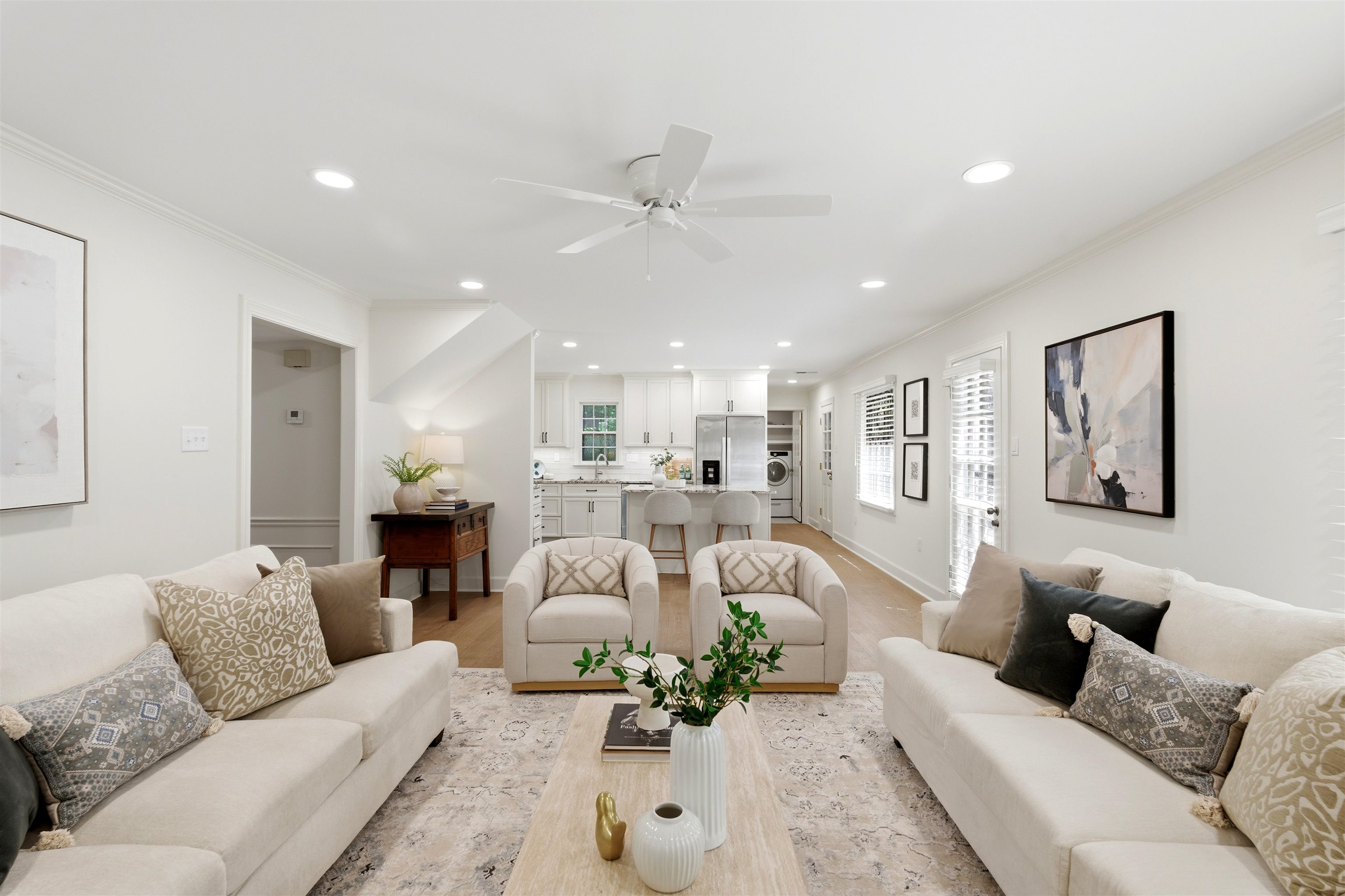 1984 Allenby Road Germantown, TN 38139 - Photo 17 of 37 Open-concept living area featuring light wood-finish flooring, recessed lighting, a ceiling fan, and white walls