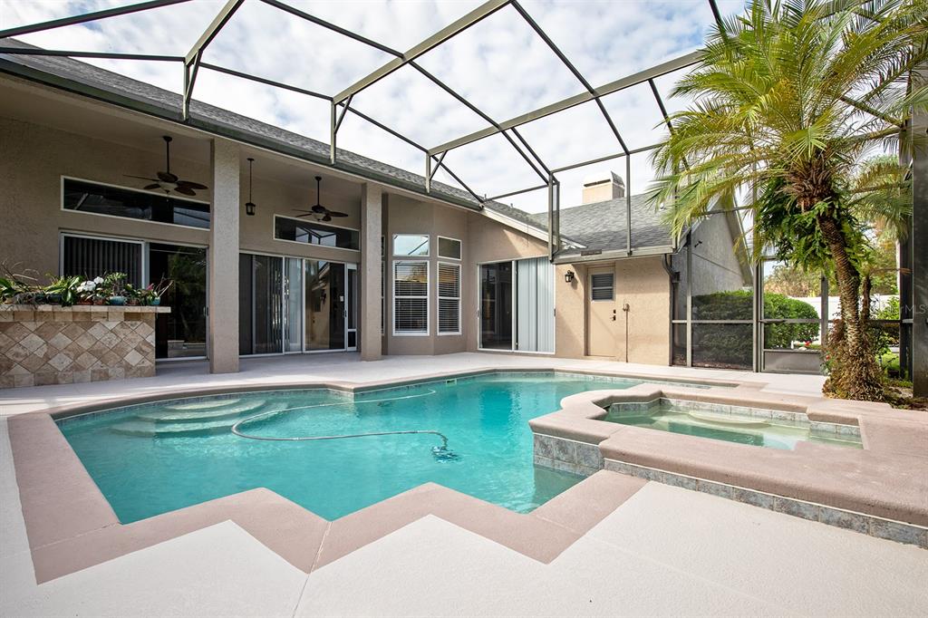 835 Grovesmere Loop Ocoee, FL 34761 - Photo 22 of 27 Screened Pool & Spa (heated)