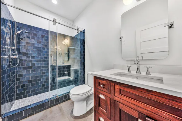 a bathroom with a toilet and a bathtub