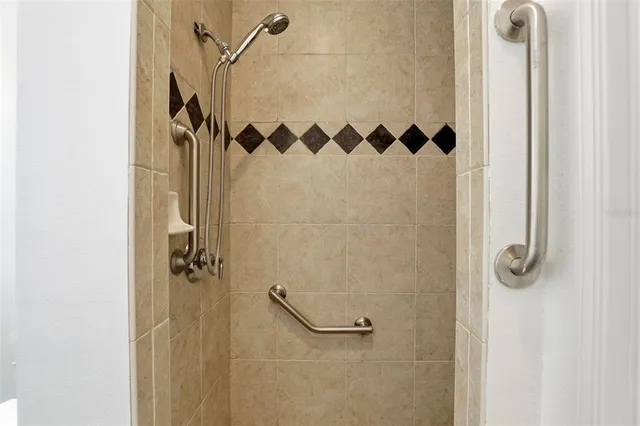 a bathroom with a toilet and a bathtub