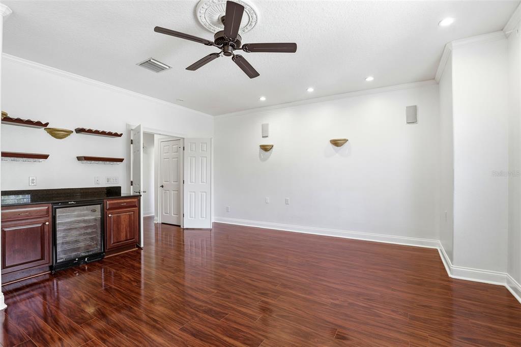 93 Braelock Drive Ocoee, FL 34761 - Photo 41 of 58 wooden floor in an empty room with a window
