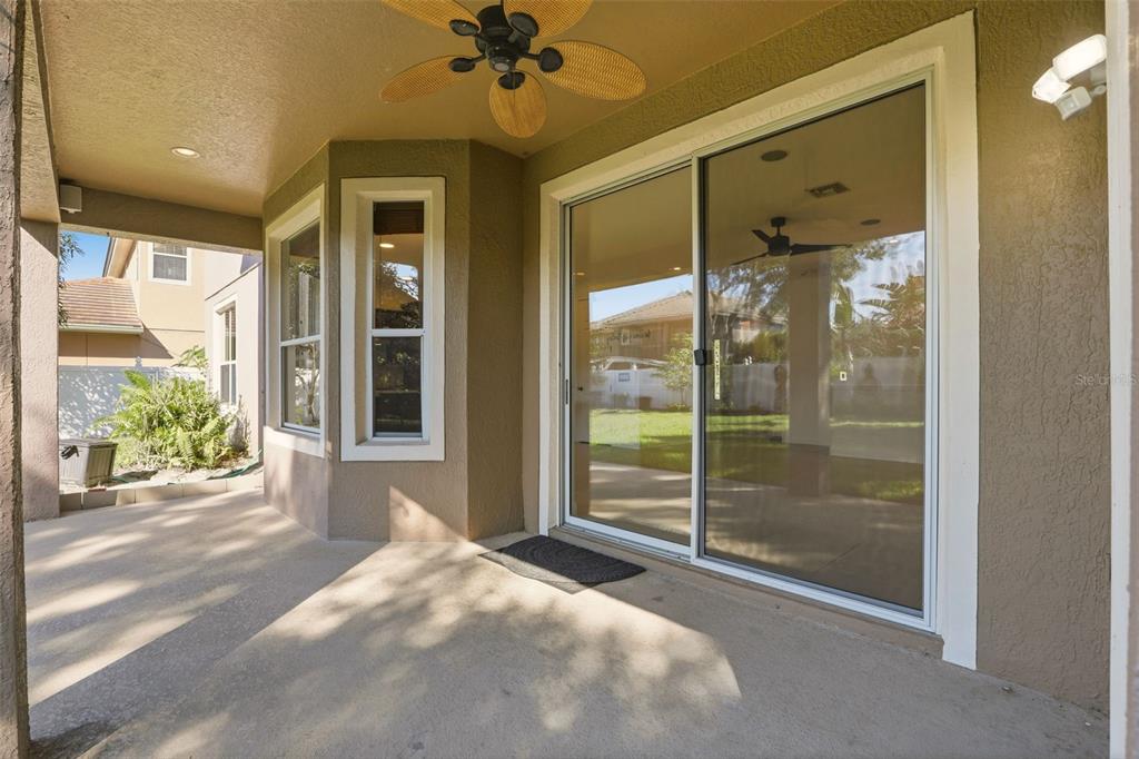 93 Braelock Drive Ocoee, FL 34761 - Photo 47 of 58 a view of a bathroom with a glass door