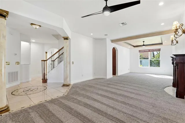 a view of a hallway with a chandelier