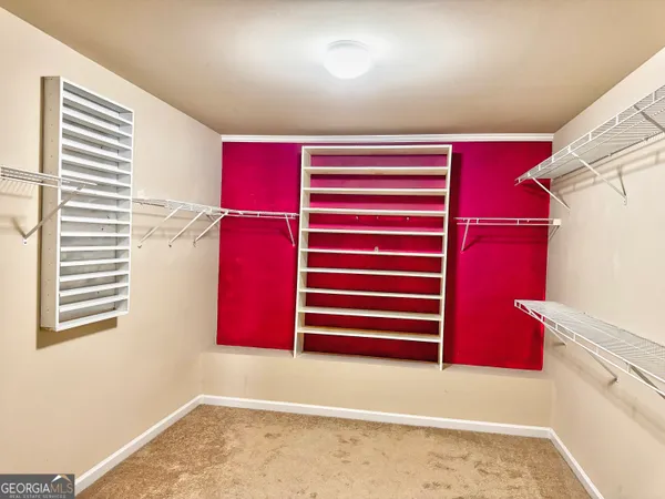 a view of room with window and stairs