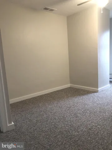 an empty room with a natural light