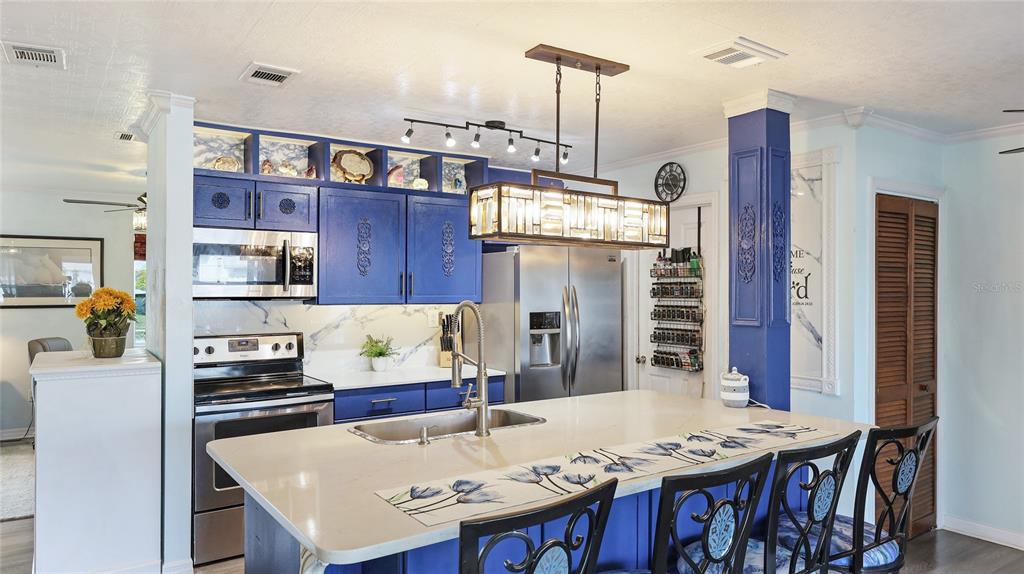 13492 Dibella Avenue Port Charlotte, FL 33981 - Photo 13 of 37 a view of a dining room with furniture