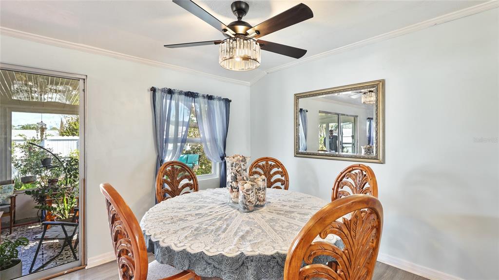 13492 Dibella Avenue Port Charlotte, FL 33981 - Photo 16 of 37 a view of a dining room with furniture