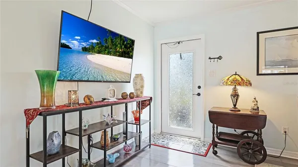 a room with furniture and air hockey table