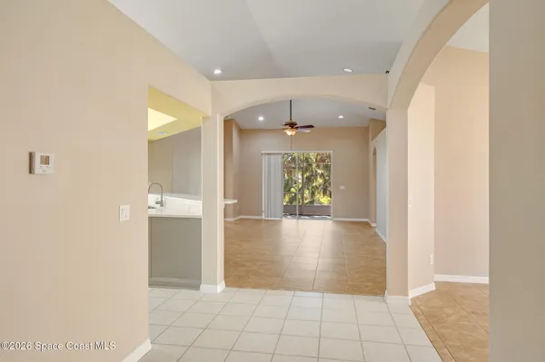 a kitchen with cabinets stainless steel appliances and a counter space