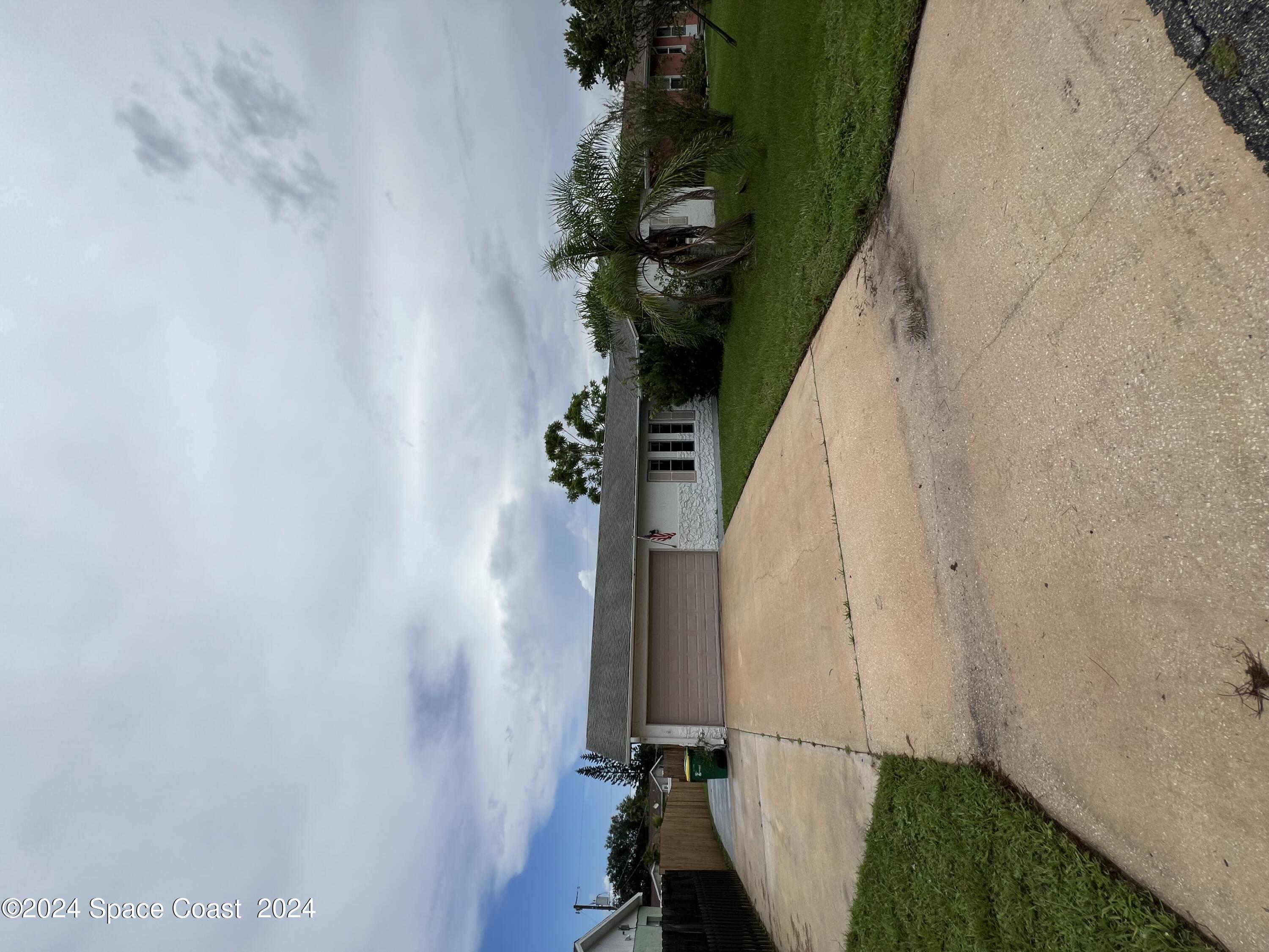 a view of outdoor space with mountain view in back