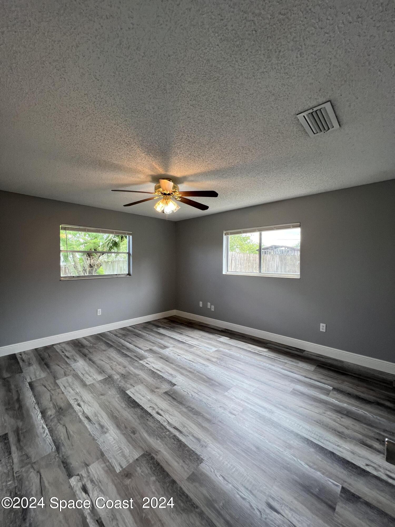 219 Capron Road Cocoa, FL 32927 - Photo 17 of 21 a view of an empty room and window