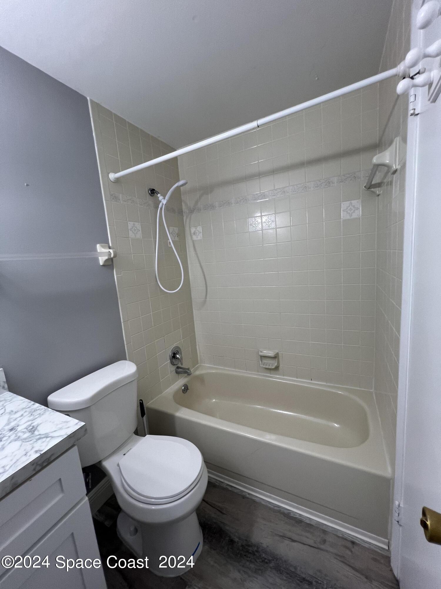 219 Capron Road Cocoa, FL 32927 - Photo 21 of 21 a bathroom with a toilet and a shower