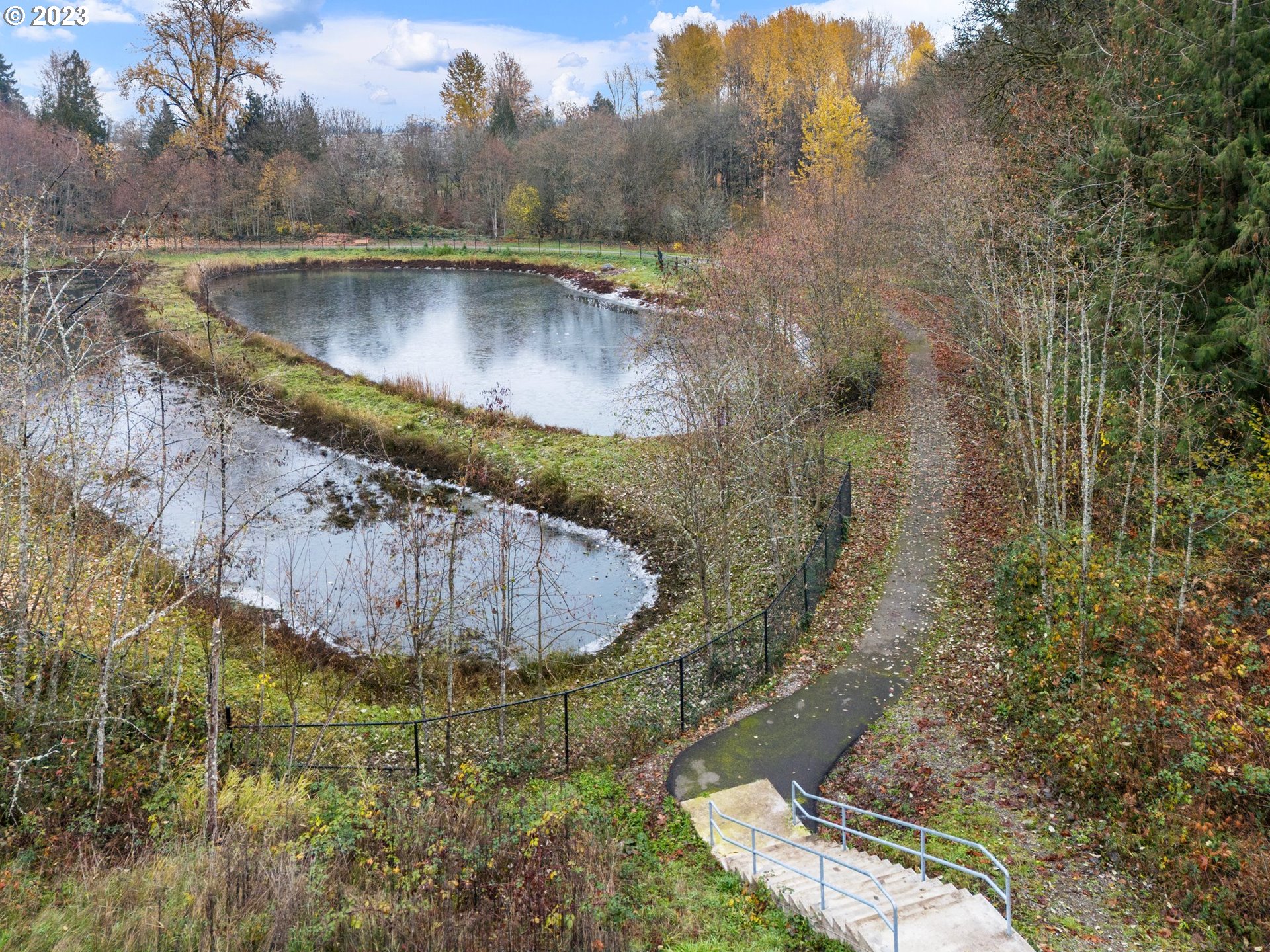 7176 South 13th Street Ridgefield, WA 98642 - Photo 42 of 46 a view of a swimming pool with a yard