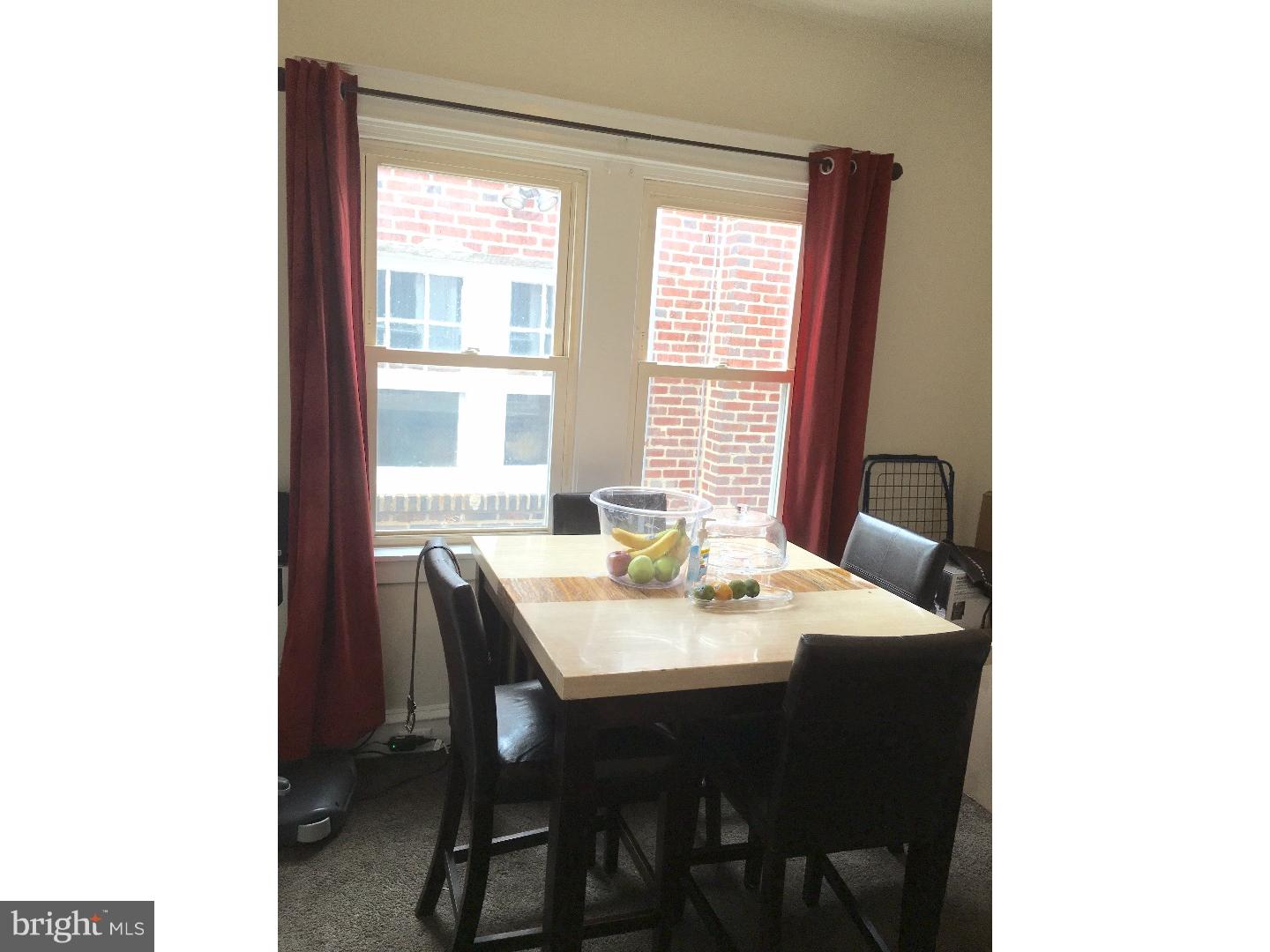 776 Garrett Road Upper Darby, PA 19082 - Photo 12 of 16 a view of a dining room with a table and chairs