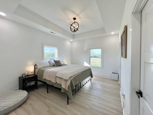 a view of a swimming pool with an outdoor space and seating area