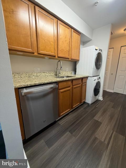 8393 Montgomery Run Road, Unit H Ellicott City, MD 21043 - Photo 14 of 30 a kitchen with granite countertop cabinets stainless steel appliances a sink and wooden floor