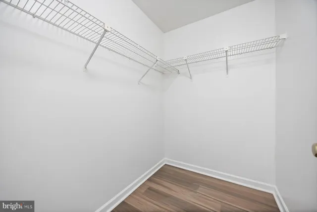 a view of a room with racks on the wall