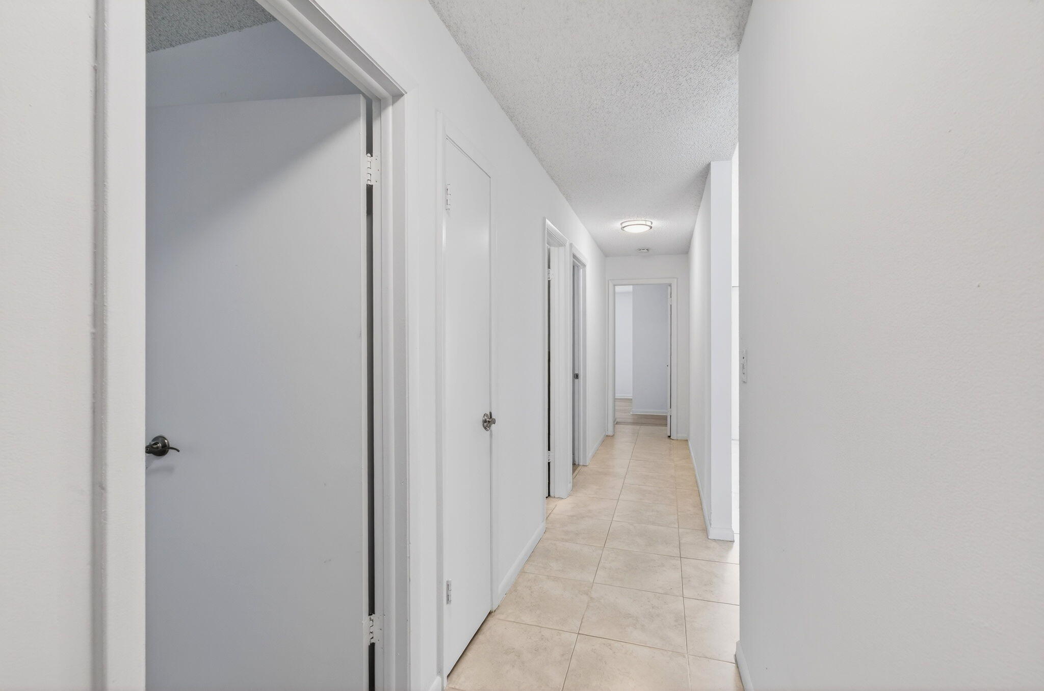 2453 Northwest 26th Circle Boca Raton, FL 33431 - Photo 44 of 88 Hall to Bedrooms