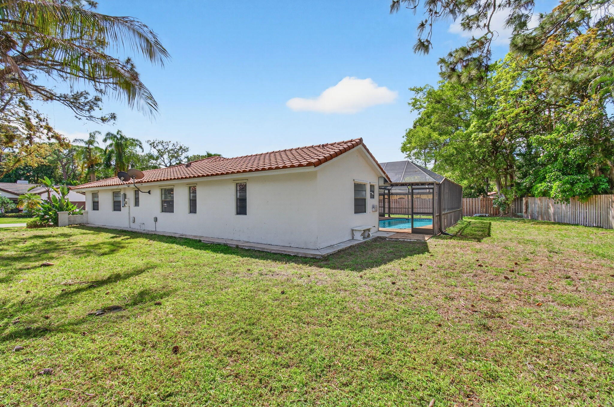 2453 Northwest 26th Circle Boca Raton, FL 33431 - Photo 74 of 88 East Side Yard