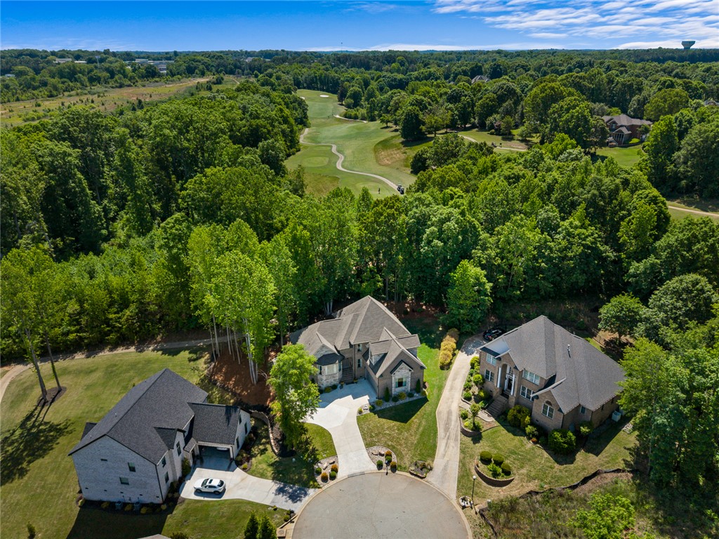 140 Turnberry Road Anderson, SC 29621 - Photo 35 of 44 This aerial view showcases a residential property nestled beside a lush golf course.