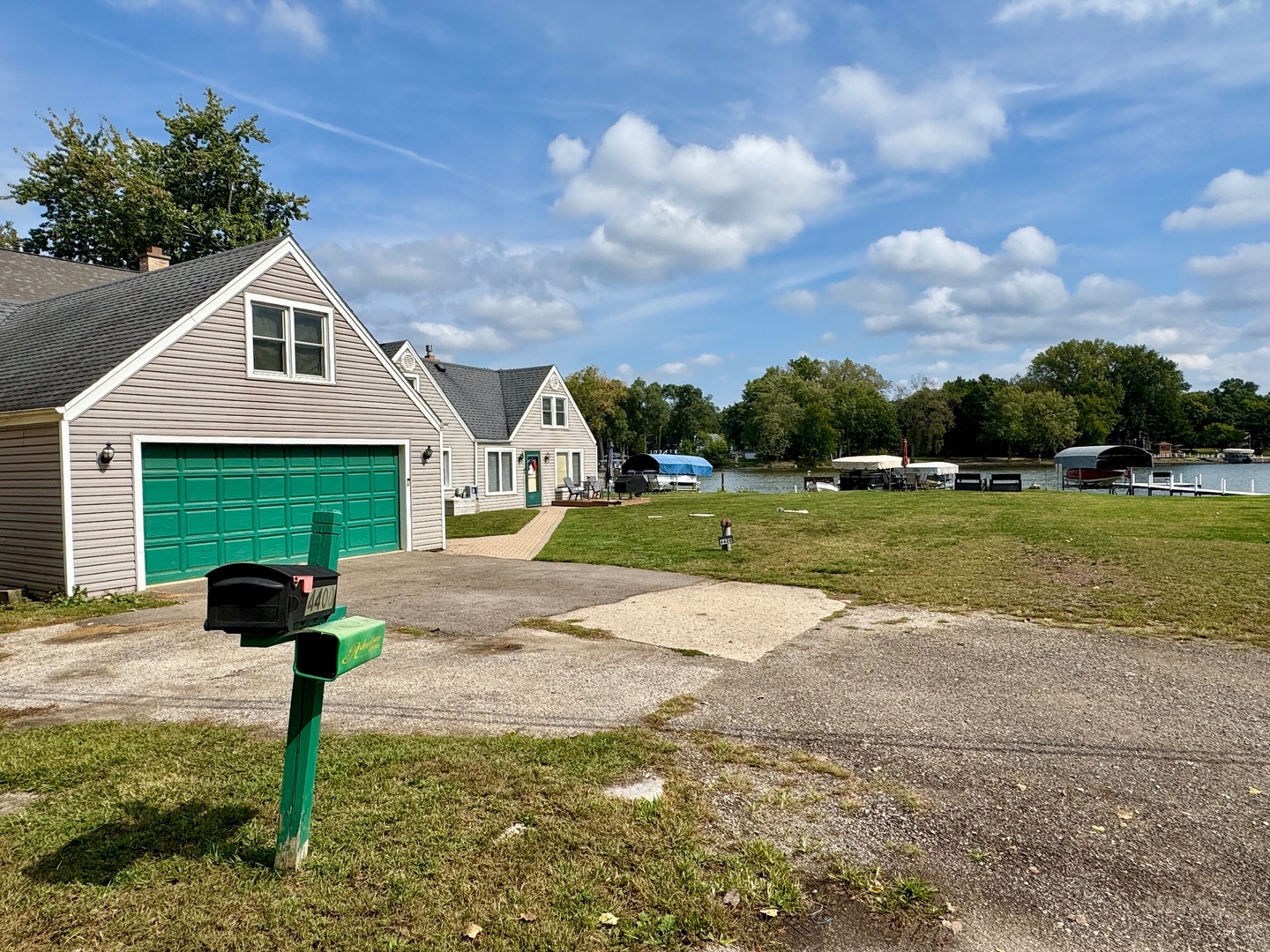 4400 Riverside Drive Crystal Lake, IL 60014 - Photo 20 of 22 a front view of a house with garden