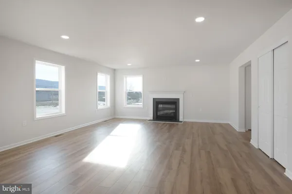 a living room with a fireplace
