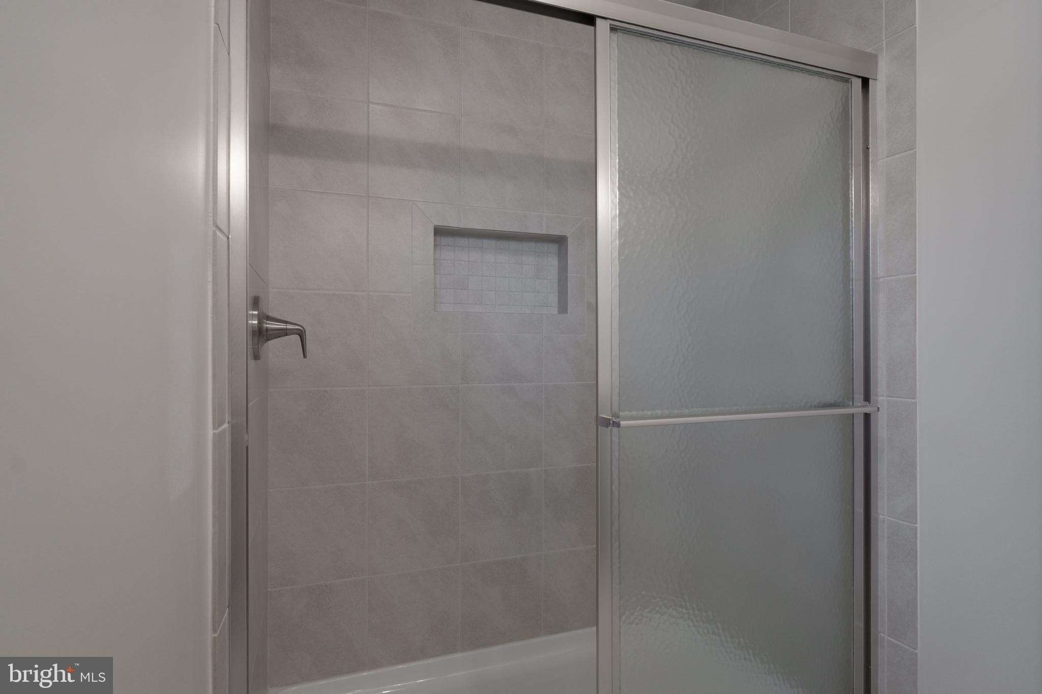 170 Ten Point Path Bellefonte, PA 16823 - Photo 26 of 45 a bathroom with a glass shower door