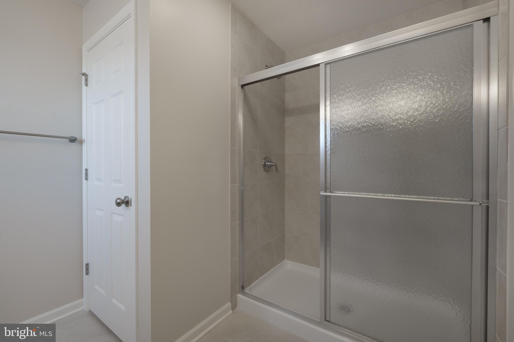 170 Ten Point Path Bellefonte, PA 16823 - Photo 28 of 45 a bathroom with a glass shower door