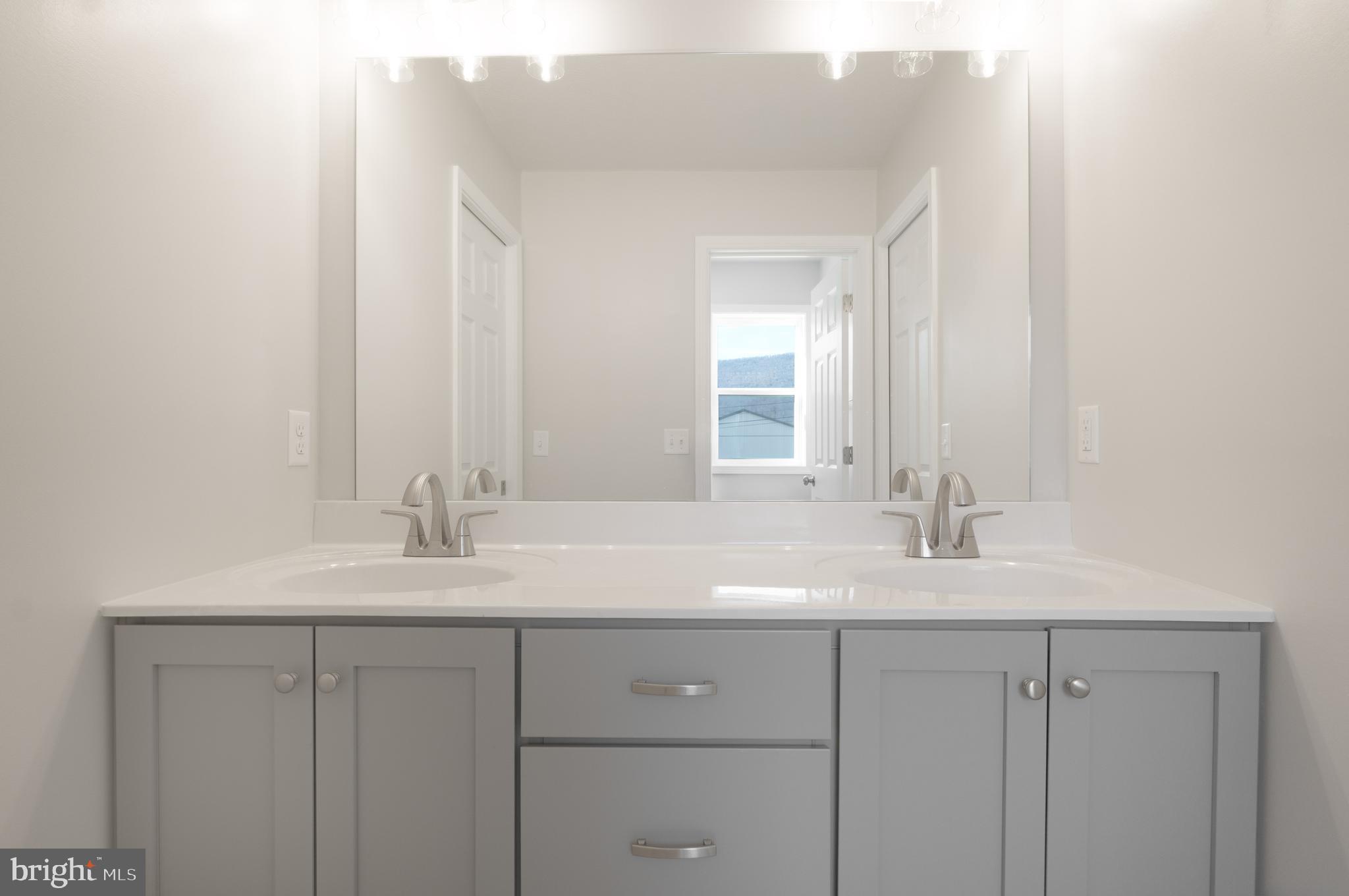 170 Ten Point Path Bellefonte, PA 16823 - Photo 36 of 45 a bathroom with a sink and a mirror