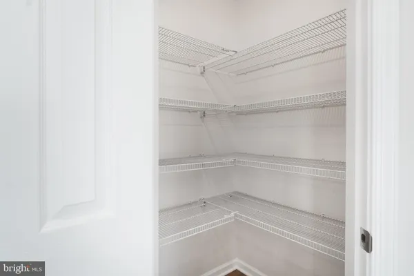 a empty closet with white paint