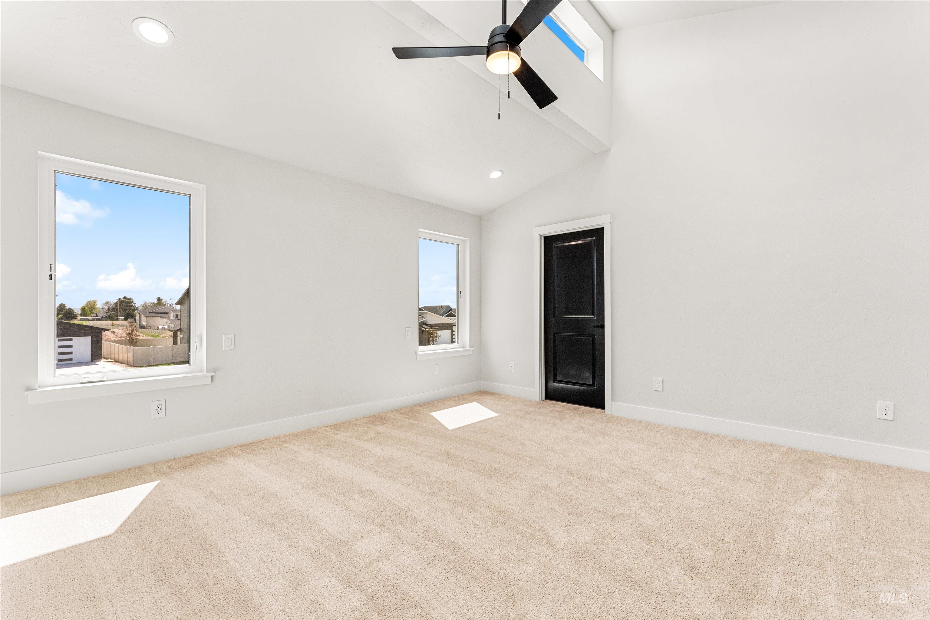 2709 West Gidran Meridian, ID 83642 - Photo 20 of 43 Spacious room featuring vaulted ceilings, recessed lighting, and light-toned carpeting