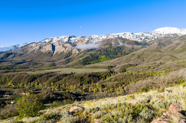 6975 North Durfee Way, Unit 20 Eden, UT 84310 - Photo 9 of 15 Expansive mountain landscape featuring snow-capped peaks and verdant valleys