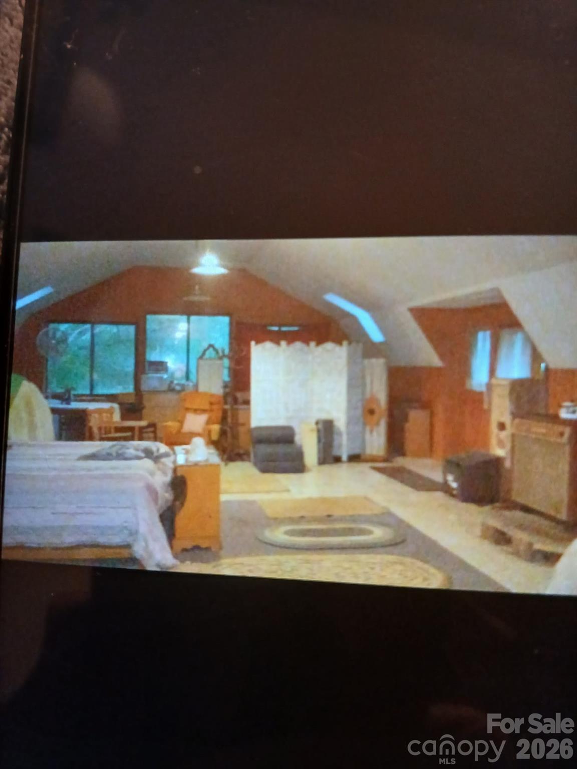 705 Dr Howell Road Spruce Pine, NC 28777 - Photo 5 of 11 a view of an outdoor kitchen and swimming pool