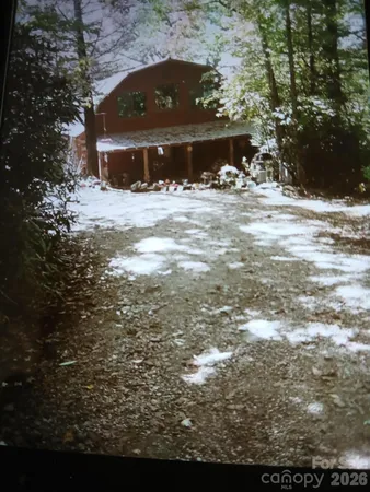 a view of a house with a snow