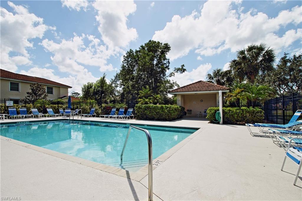 422 Valerie Way, Unit 202 Naples, FL 34104 - Photo 16 of 19 a view of a house with pool