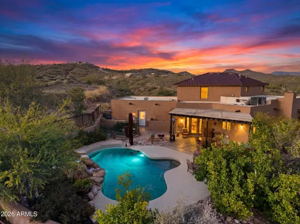 an aerial view of a house with a garden