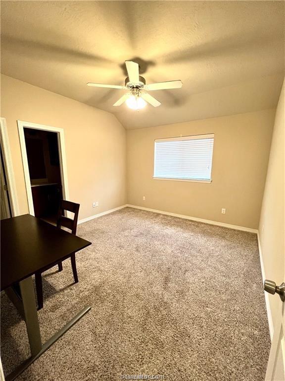 1198 Jones-Butler Road, Unit 3113 College Station, TX 77840 - Photo 11 of 13 a view of a workspace with furniture and a window