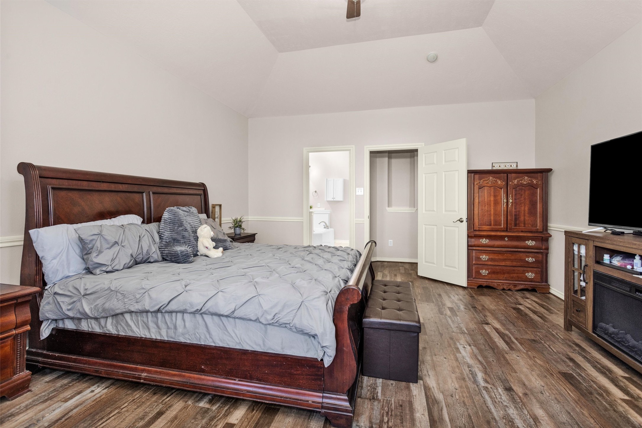 30110 Legends Ridge Drive Spring, TX 77386 - Photo 23 of 49 a bedroom with a bed and wooden floor
