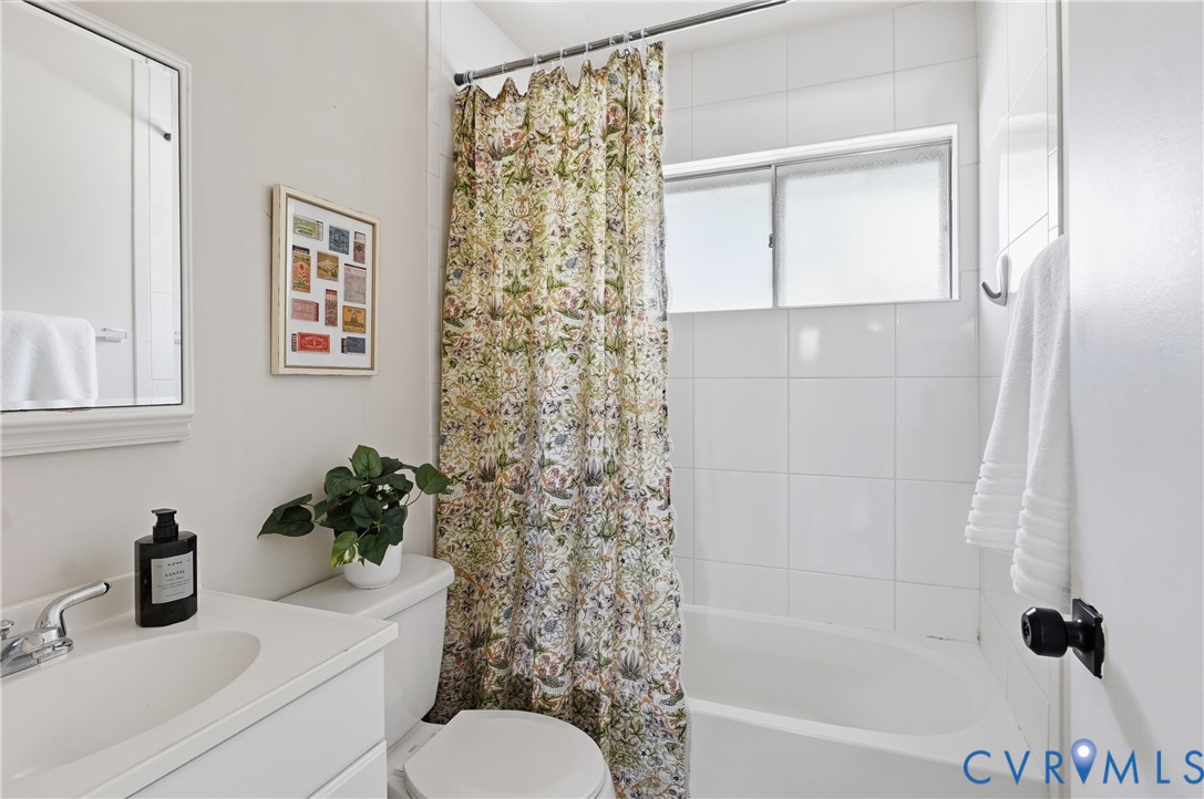 9207 Mapleway Road Richmond, VA 23229 - Photo 30 of 36 Bathroom featuring a white vanity with integrated