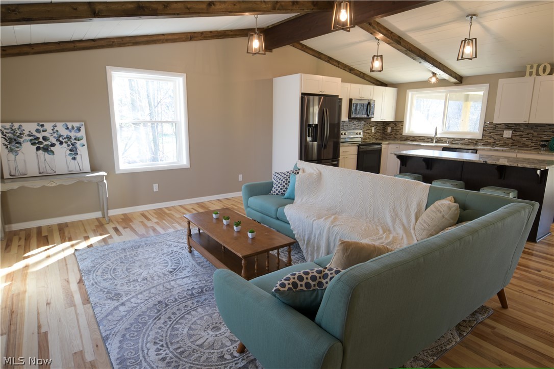 6420 Dewey Road Thompson, OH 44086 - Photo 5 of 32 Hardwood floors & shiplap ceilings