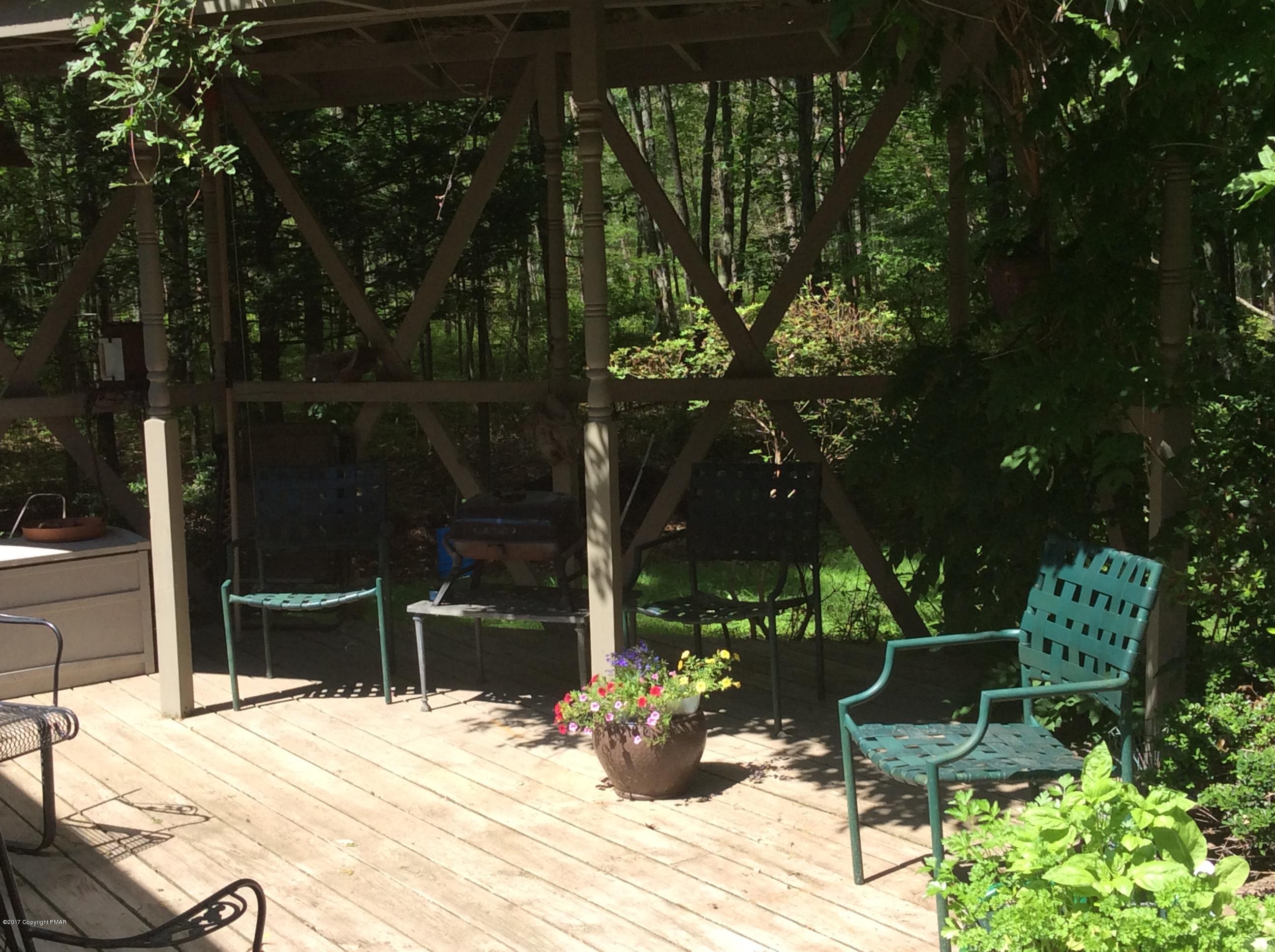 319 Henry's Crossing Road Cresco, PA 18326 - Photo 25 of 29 a view of a chair and tables front of the house