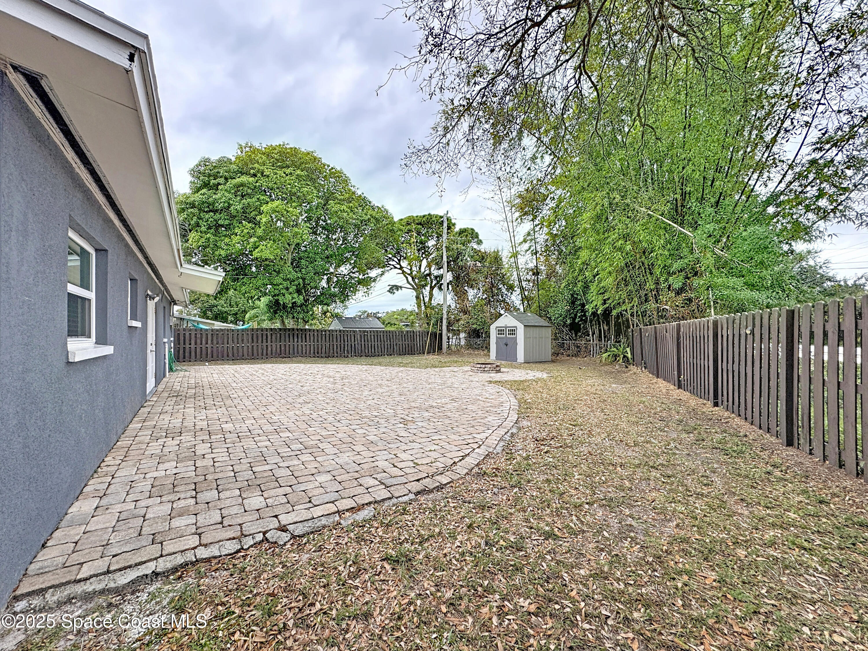 170 Moore Avenue Merritt Island, FL 32952 - Photo 19 of 23 a view of backyard with green space