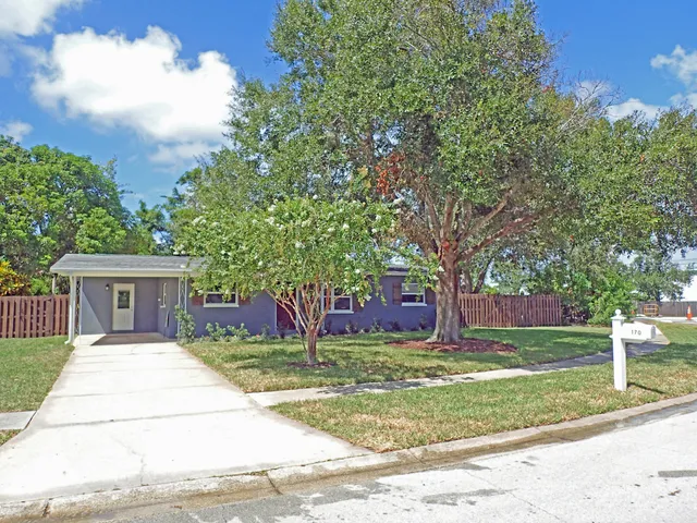 a house view with a garden space