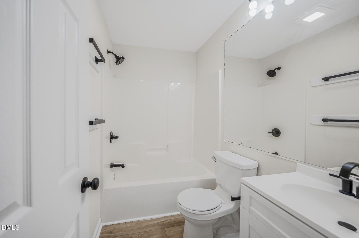 201 Howell Street, Unit 300A Chapel Hill, NC 27514 - Photo 14 of 15 a white toilet sitting next to a bathroom sink