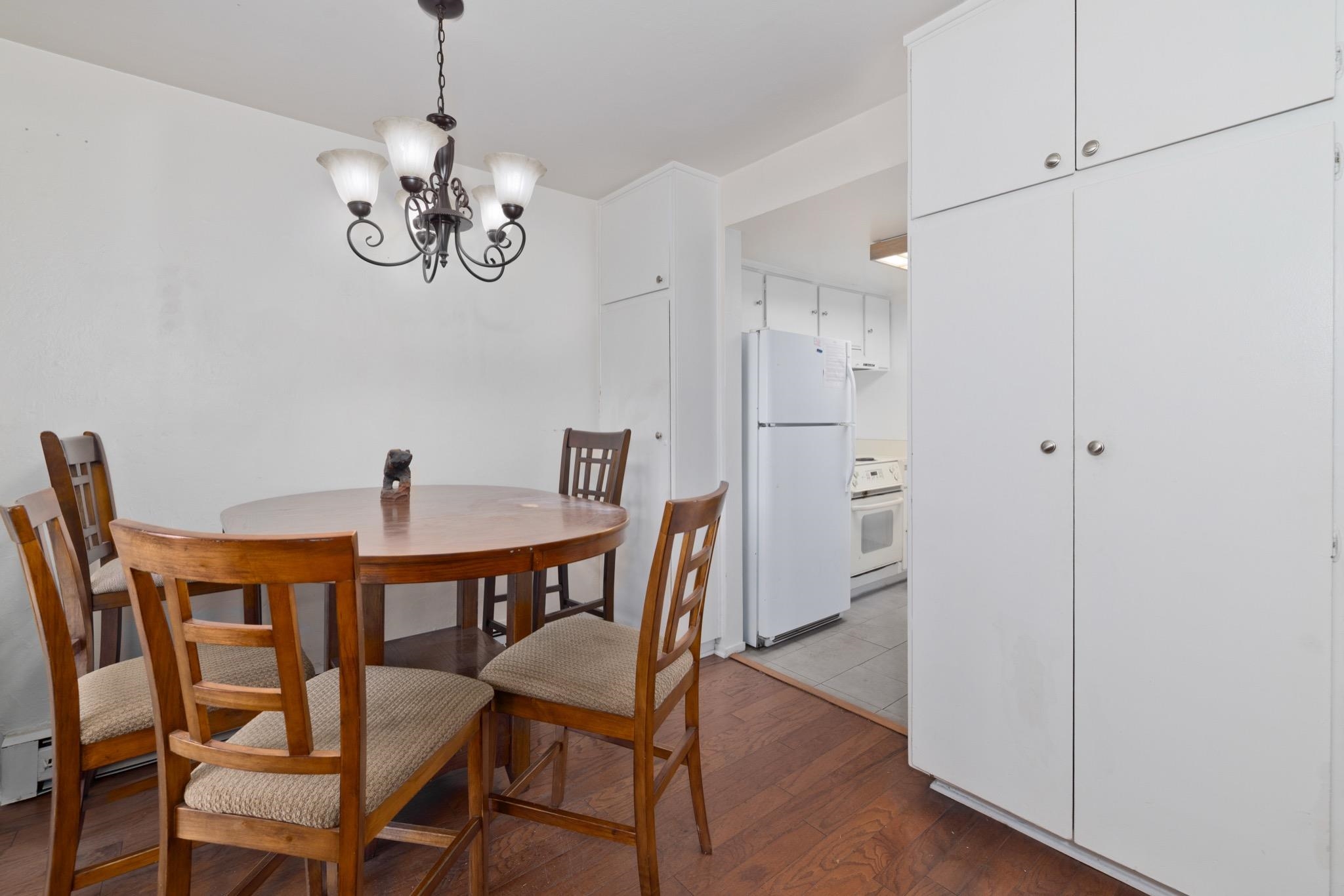 25 Lee Road, Unit 103 Mammoth Lakes, CA 93546 - Photo 5 of 29 a view of a dining room with furniture and chandelier