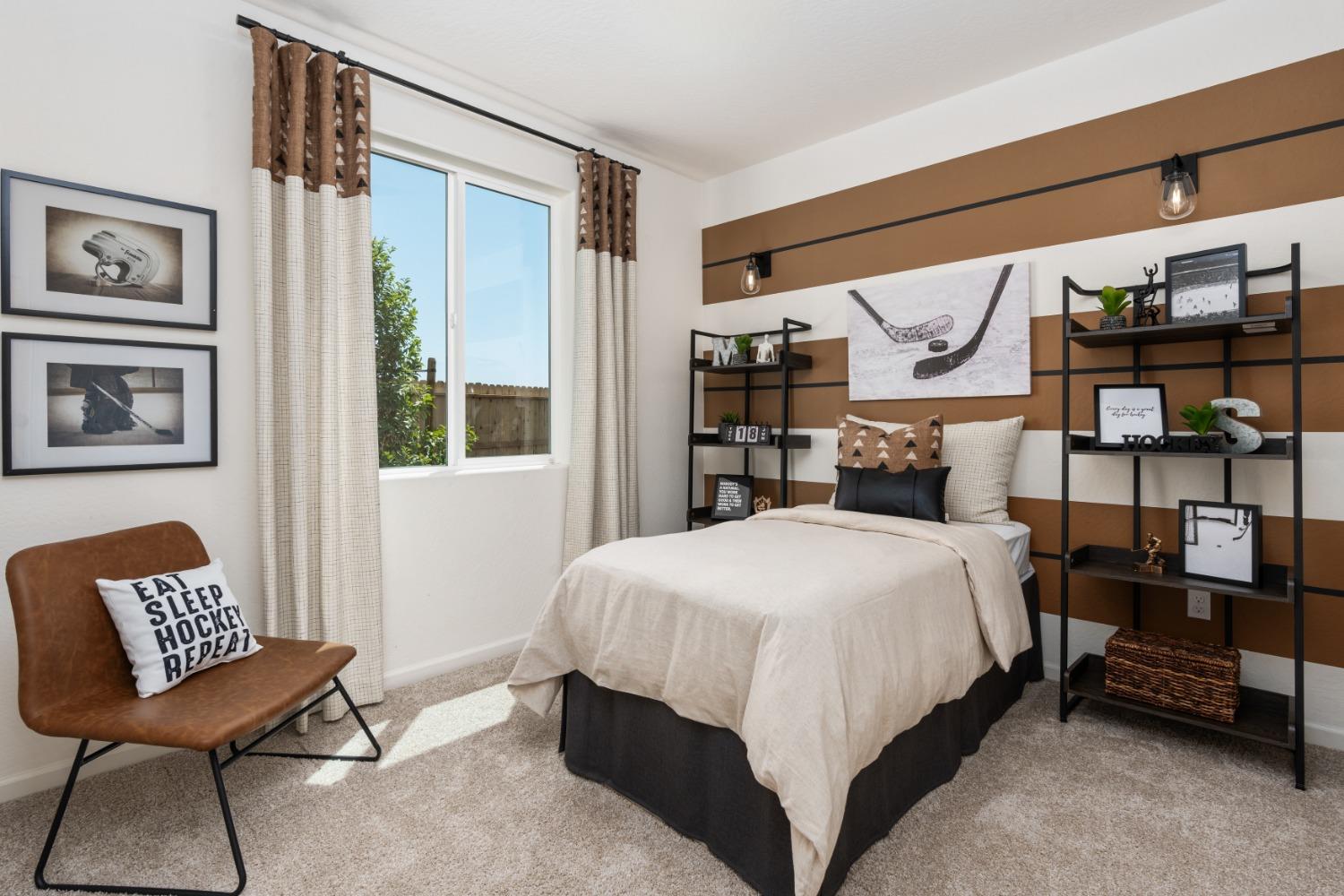 1680 Bloom Avenue Clovis, CA 93619 - Photo 17 of 28 a bedroom with a bed chair and window