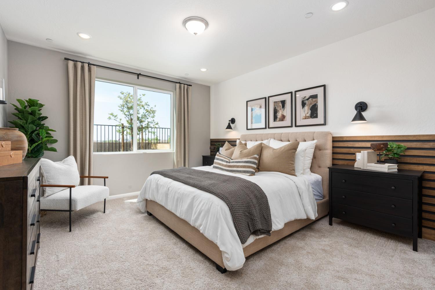 1680 Bloom Avenue Clovis, CA 93619 - Photo 22 of 28 a spacious bedroom with a bed and a window