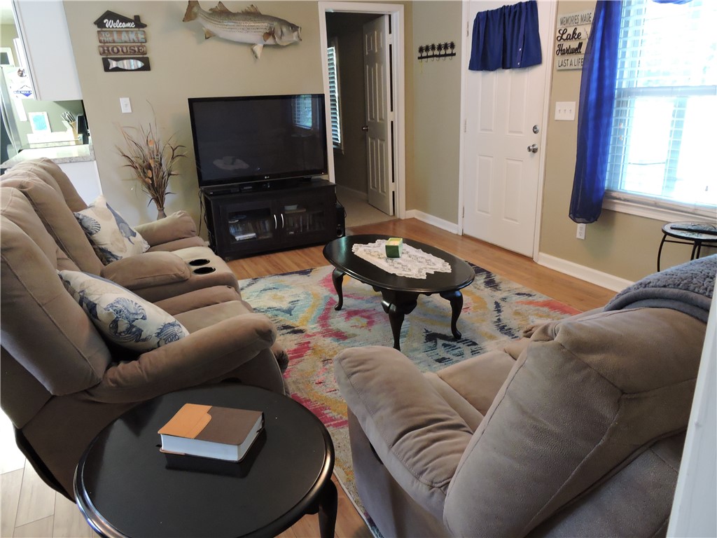1901 Hattons Ford Road Townville, SC 29689 - Photo 7 of 33 Natural light illuminates a cozy living space, perfect for unwinding.
